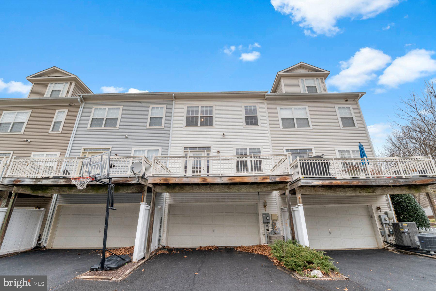 12802 Brightwell Drive Clarksburg, MD 20871 - Photo 2 of 30 a front view of a house with a yard