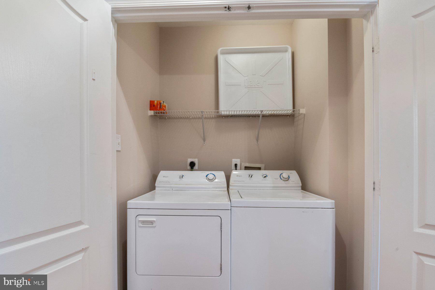12802 Brightwell Drive Clarksburg, MD 20871 - Photo 22 of 30 a utility room with dryer and washer