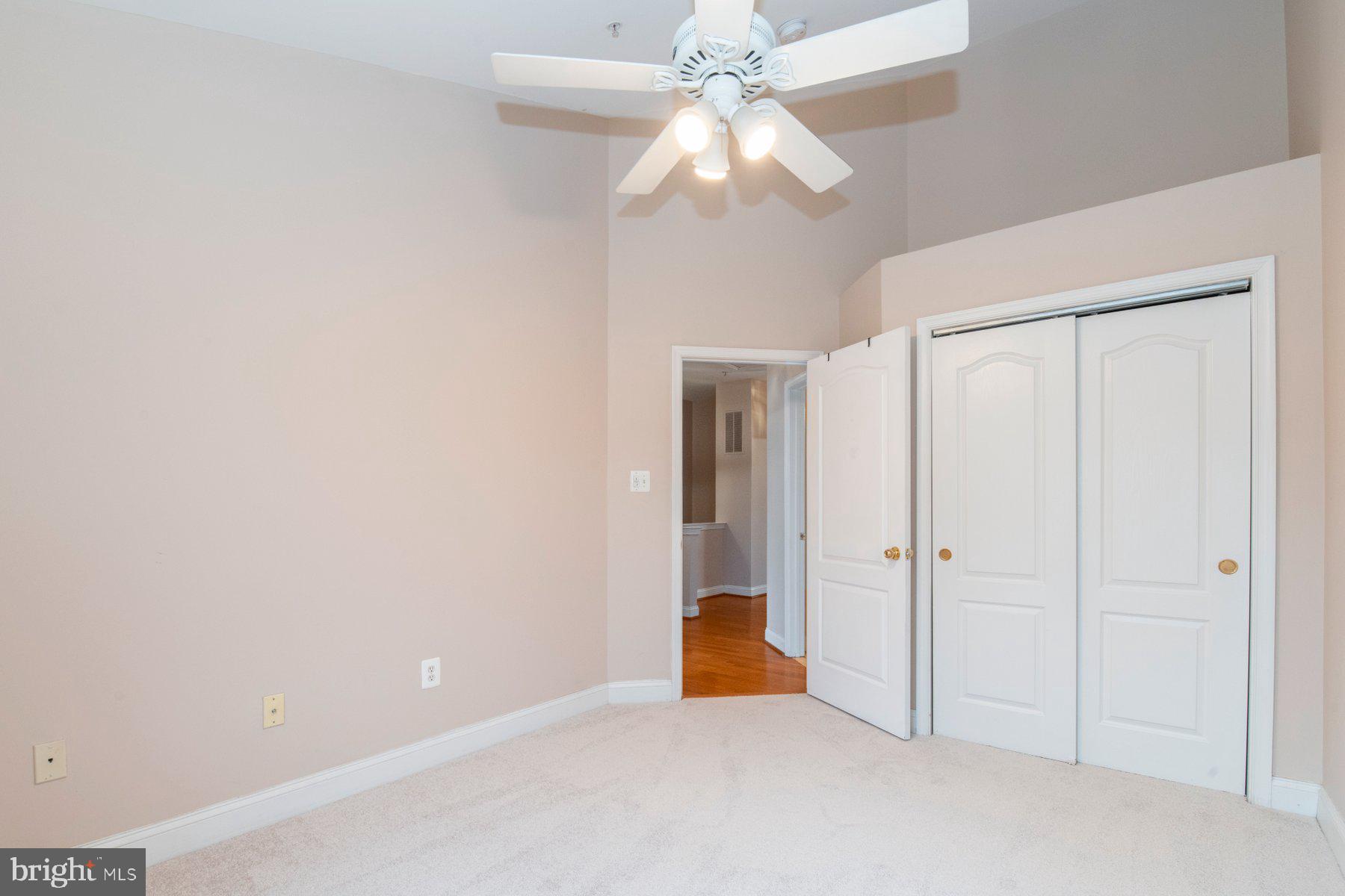 12802 Brightwell Drive Clarksburg, MD 20871 - Photo 10 of 30 an empty room with fan and entrance