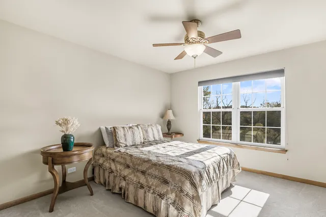 a view of a dining room with furniture and a flat screen tv