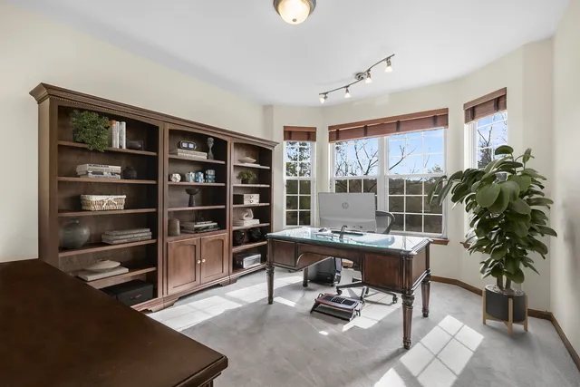 a bathroom with a sink toilet a mirror and shower