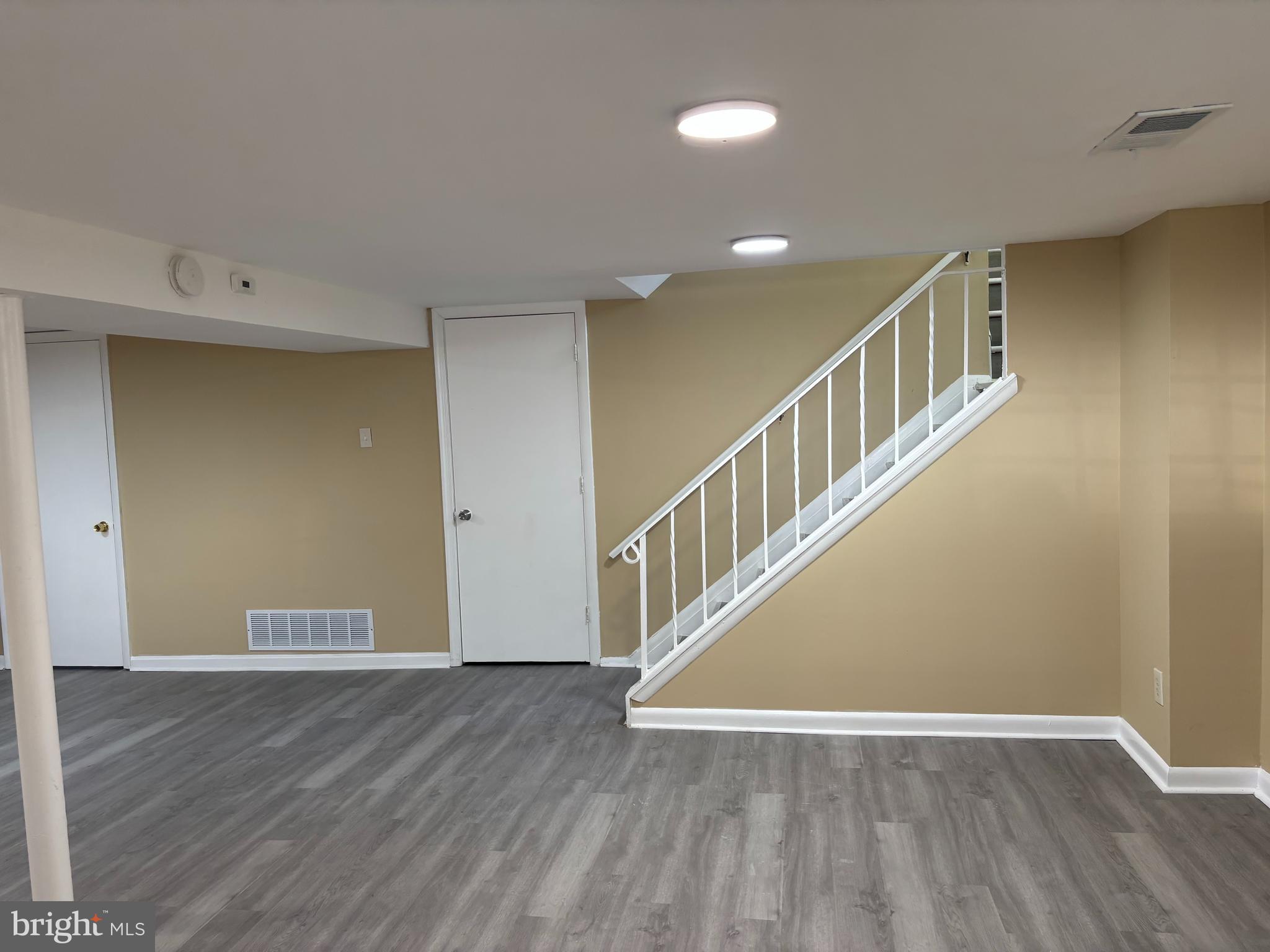 9016 Samoset Road Randallstown, MD 21133 - Photo 14 of 36 a view of room with wooden floor
