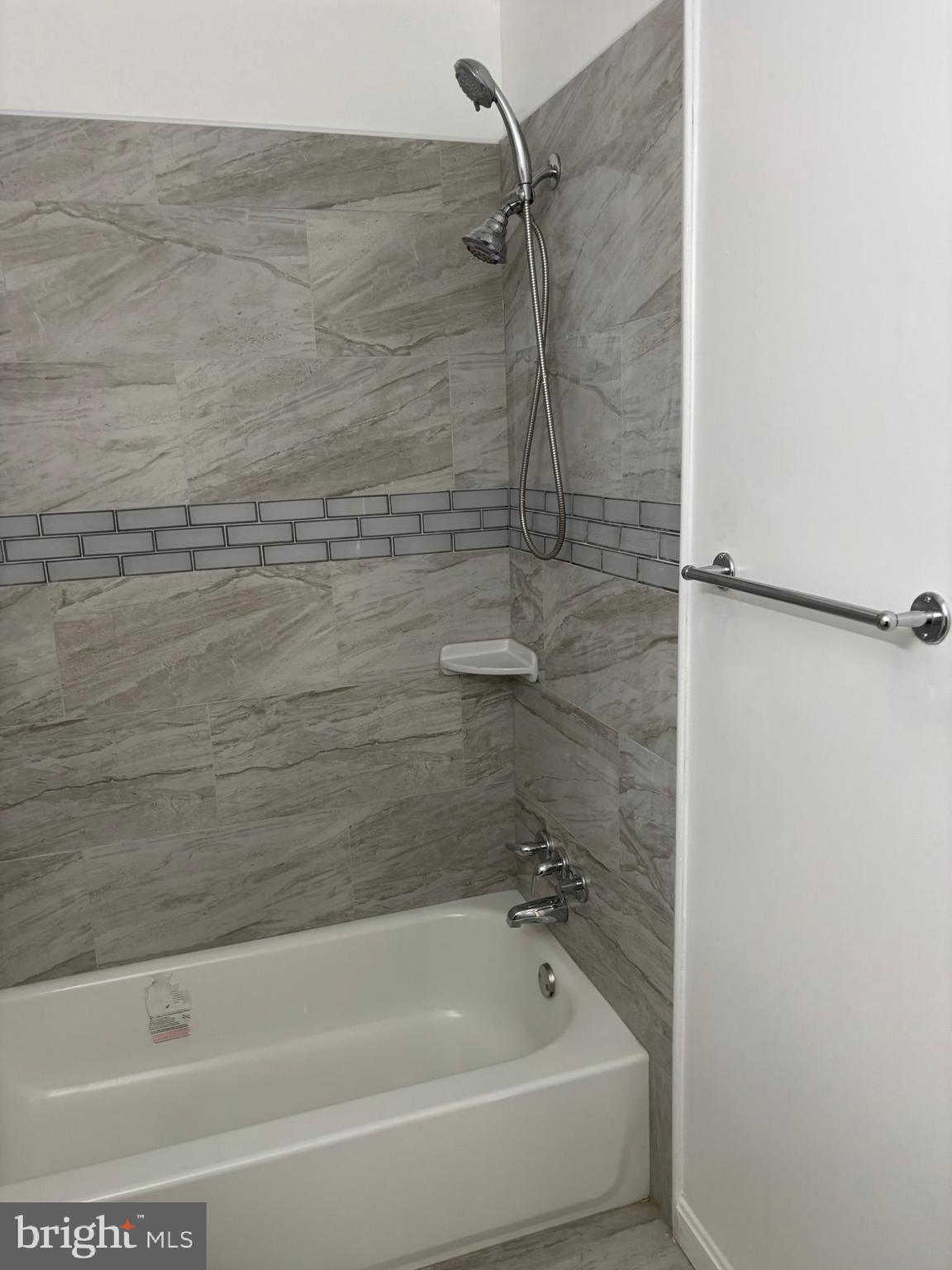 9016 Samoset Road Randallstown, MD 21133 - Photo 26 of 36 a bathroom with a bathtub