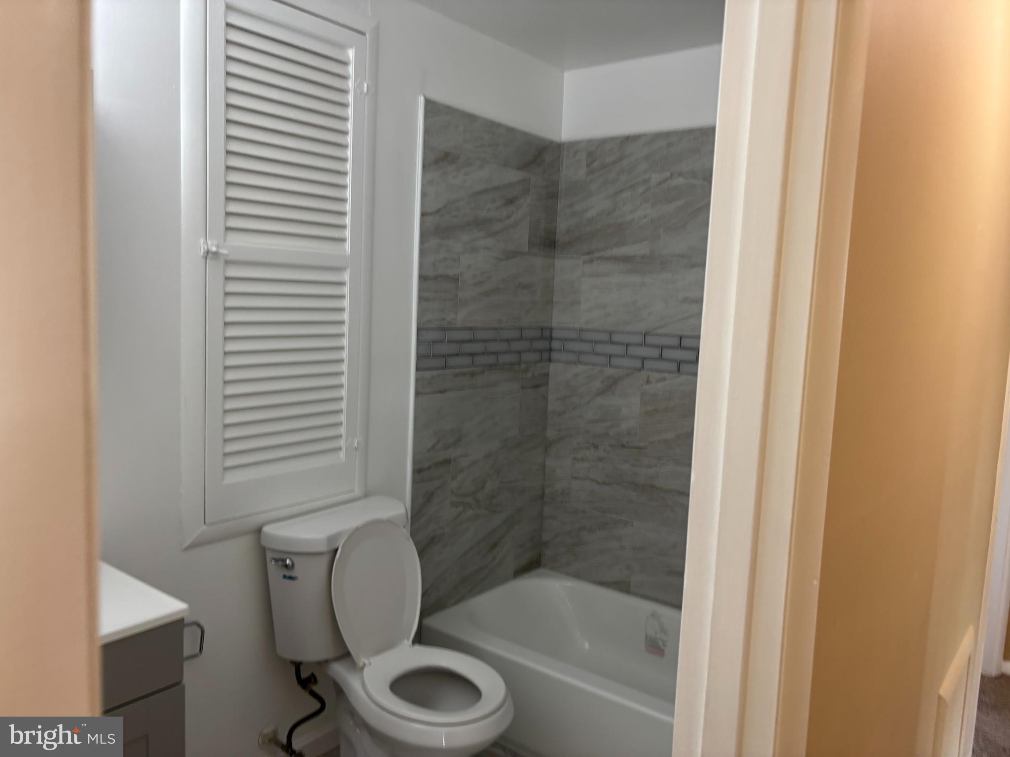 9016 Samoset Road Randallstown, MD 21133 - Photo 36 of 36 a bathroom with a shower and a toilet