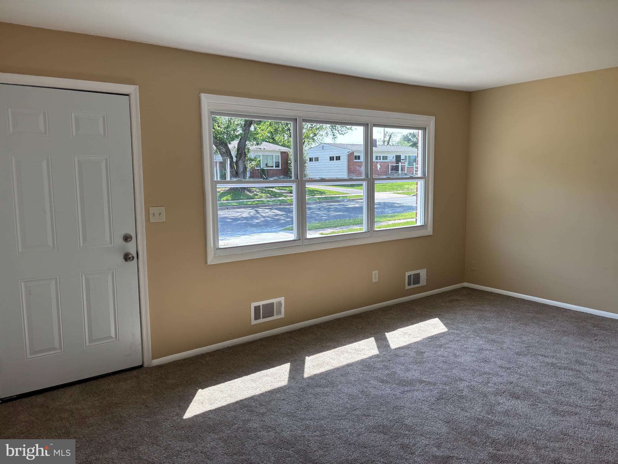 9016 Samoset Road Randallstown, MD 21133 - Photo 8 of 36 an empty room with a window