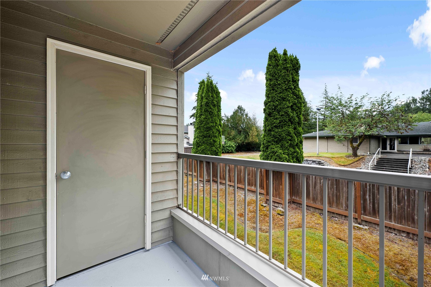 20318 Bothell Everett Highway, Unit A202 Bothell, WA 98012 - Photo 12 of 28 a view of a balcony with lake view