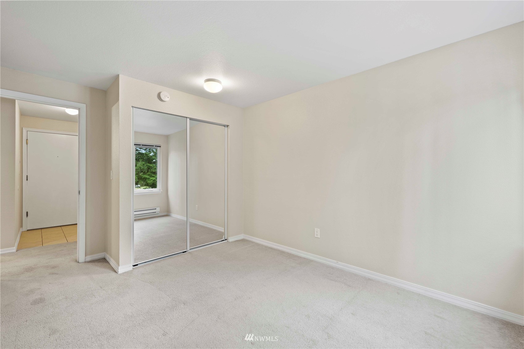 20318 Bothell Everett Highway, Unit A202 Bothell, WA 98012 - Photo 22 of 28 a view of an empty room