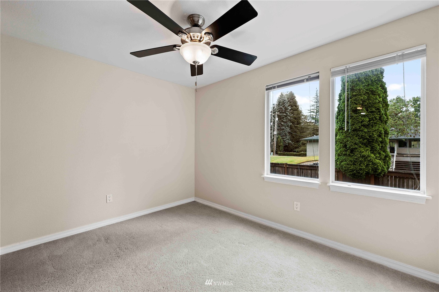 20318 Bothell Everett Highway, Unit A202 Bothell, WA 98012 - Photo 9 of 28 an empty room with a window