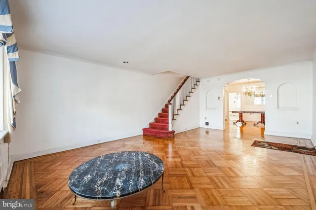 wooden floor with an entryway