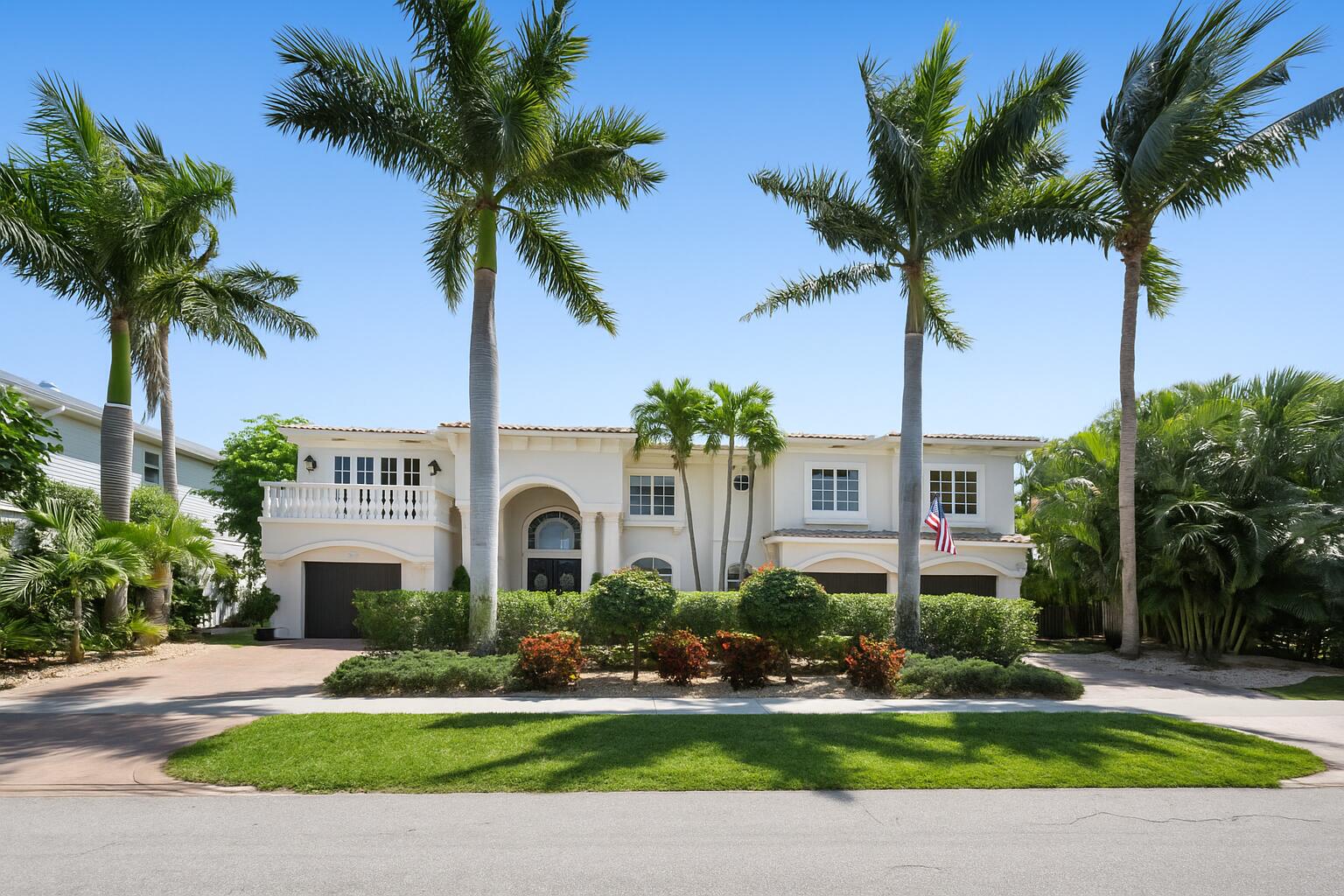 712 Northeast 71st Street Boca Raton, FL 33487 - Photo 1 of 97 a front view of multi story residential apartment building with yard and green space