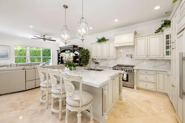 a living room with furniture and windows