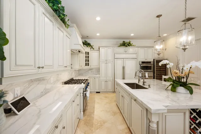 a room with pool table and windows