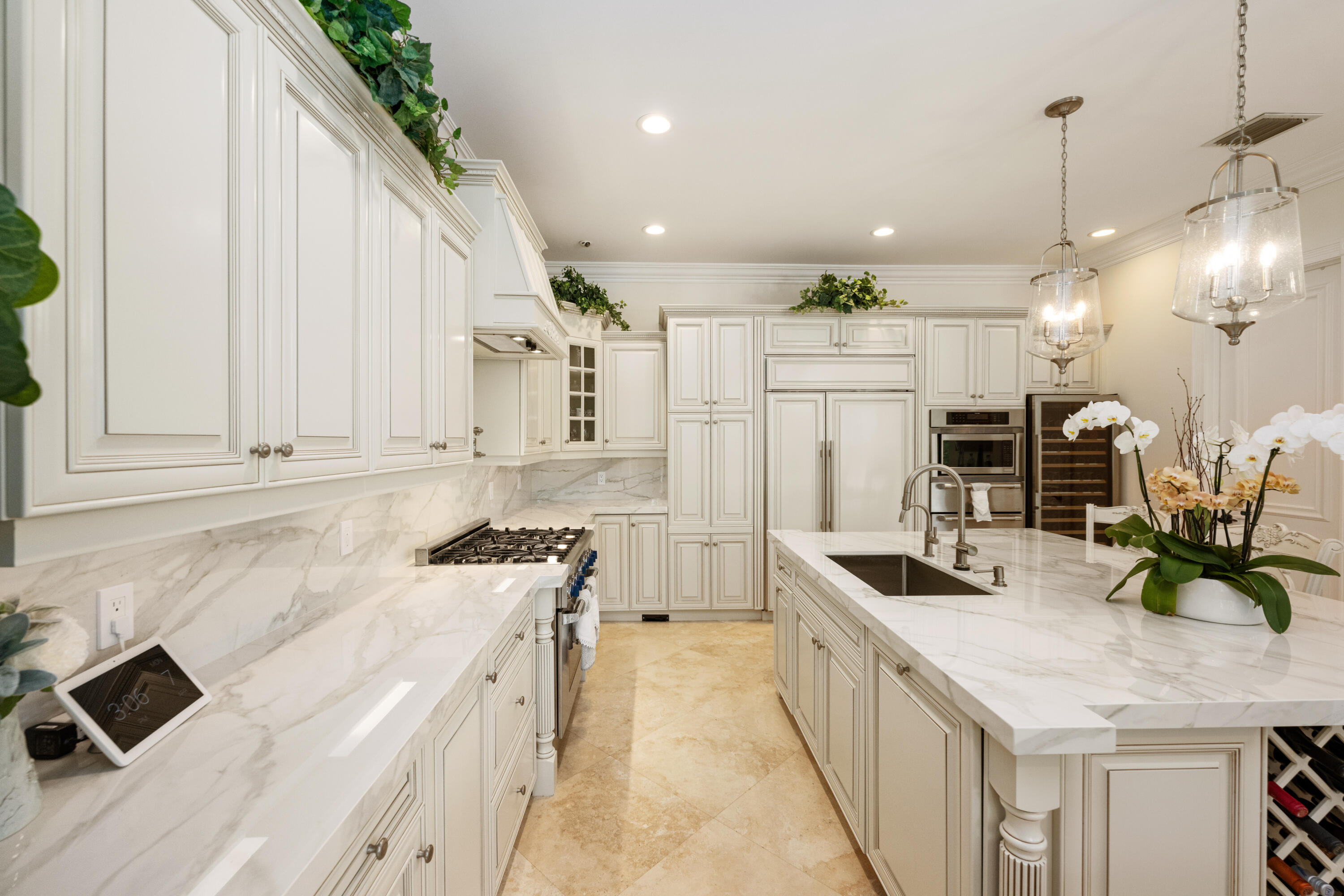 712 Northeast 71st Street Boca Raton, FL 33487 - Photo 21 of 97 a kitchen with stainless steel appliances granite countertop a sink a stove and a refrigerator