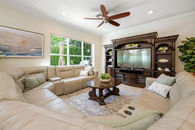a bathroom with a double vanity sink mirror and bathtub