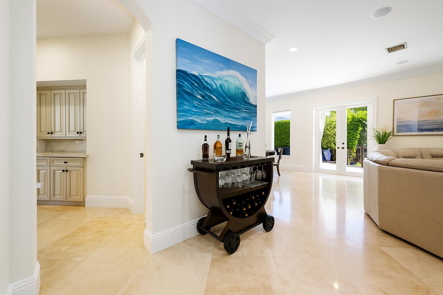 712 Northeast 71st Street Boca Raton, FL 33487 - Photo 27 of 97 a living room with furniture and a flat screen tv