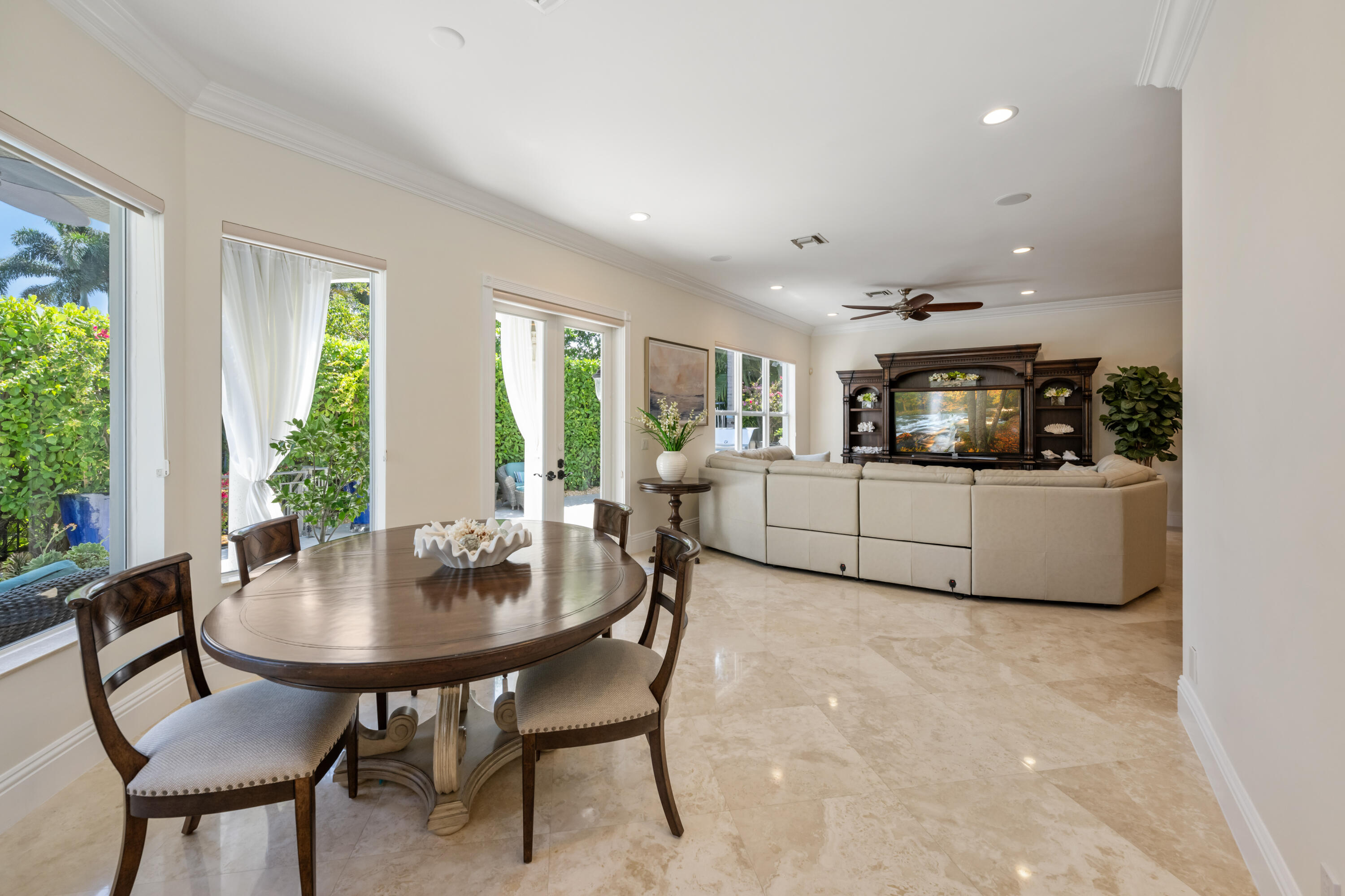 712 Northeast 71st Street Boca Raton, FL 33487 - Photo 29 of 97 a living room with furniture and windows
