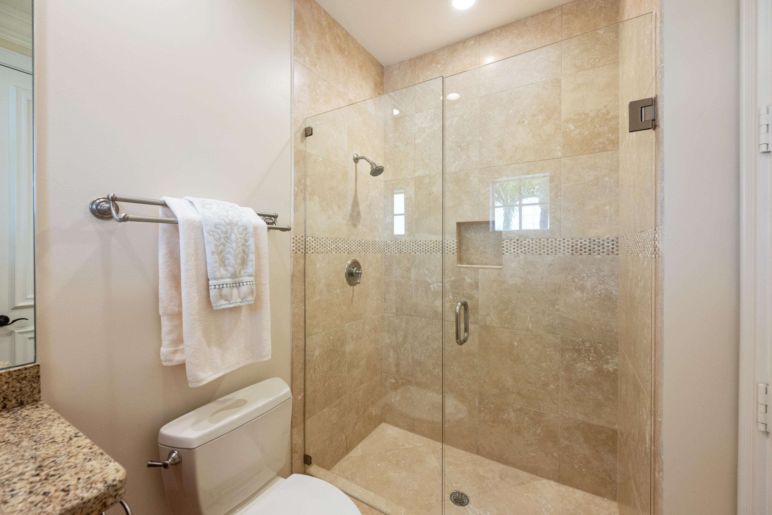 712 Northeast 71st Street Boca Raton, FL 33487 - Photo 64 of 97 a bathroom with a shower and toilet