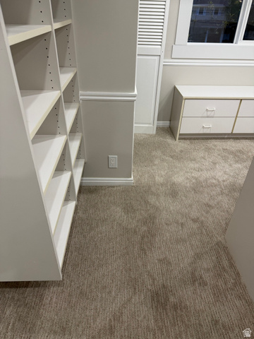 8965 Quail Run Drive Sandy, UT 84093 - Photo 35 of 56 Walk in closet featuring dark carpet