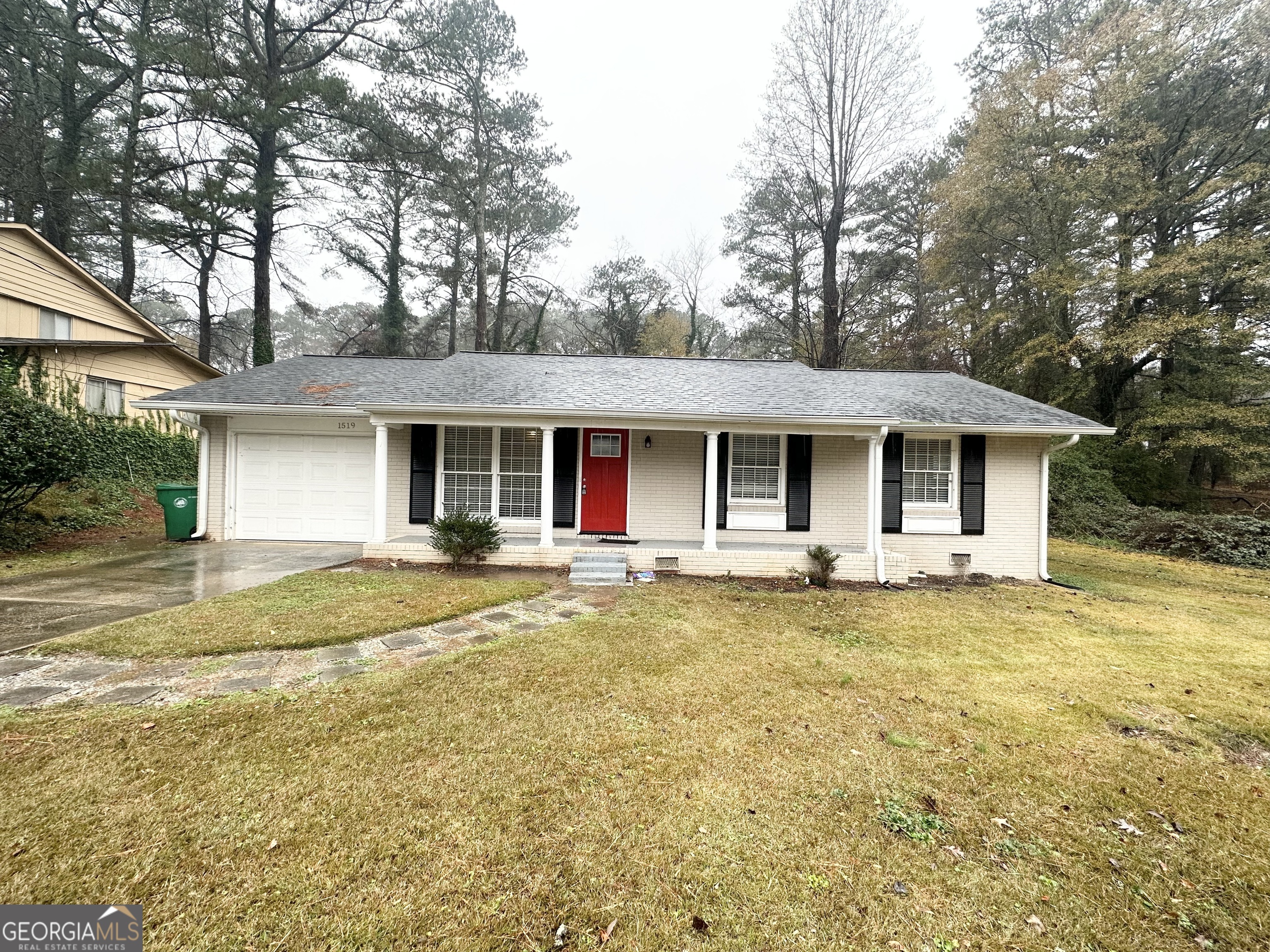 1519 Pine Glen Circle Decatur, GA 30035 - Photo 2 of 10 a view of house with outdoor space and swimming pool