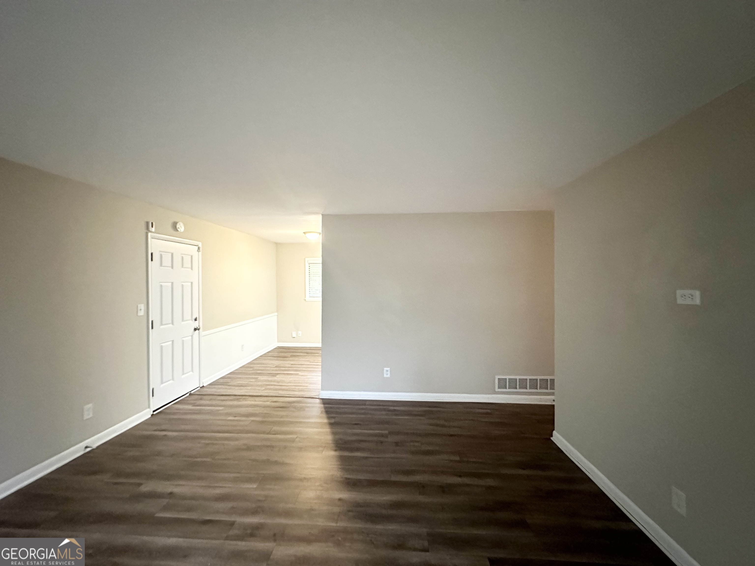 1519 Pine Glen Circle Decatur, GA 30035 - Photo 3 of 10 a view of an empty room with wooden floor