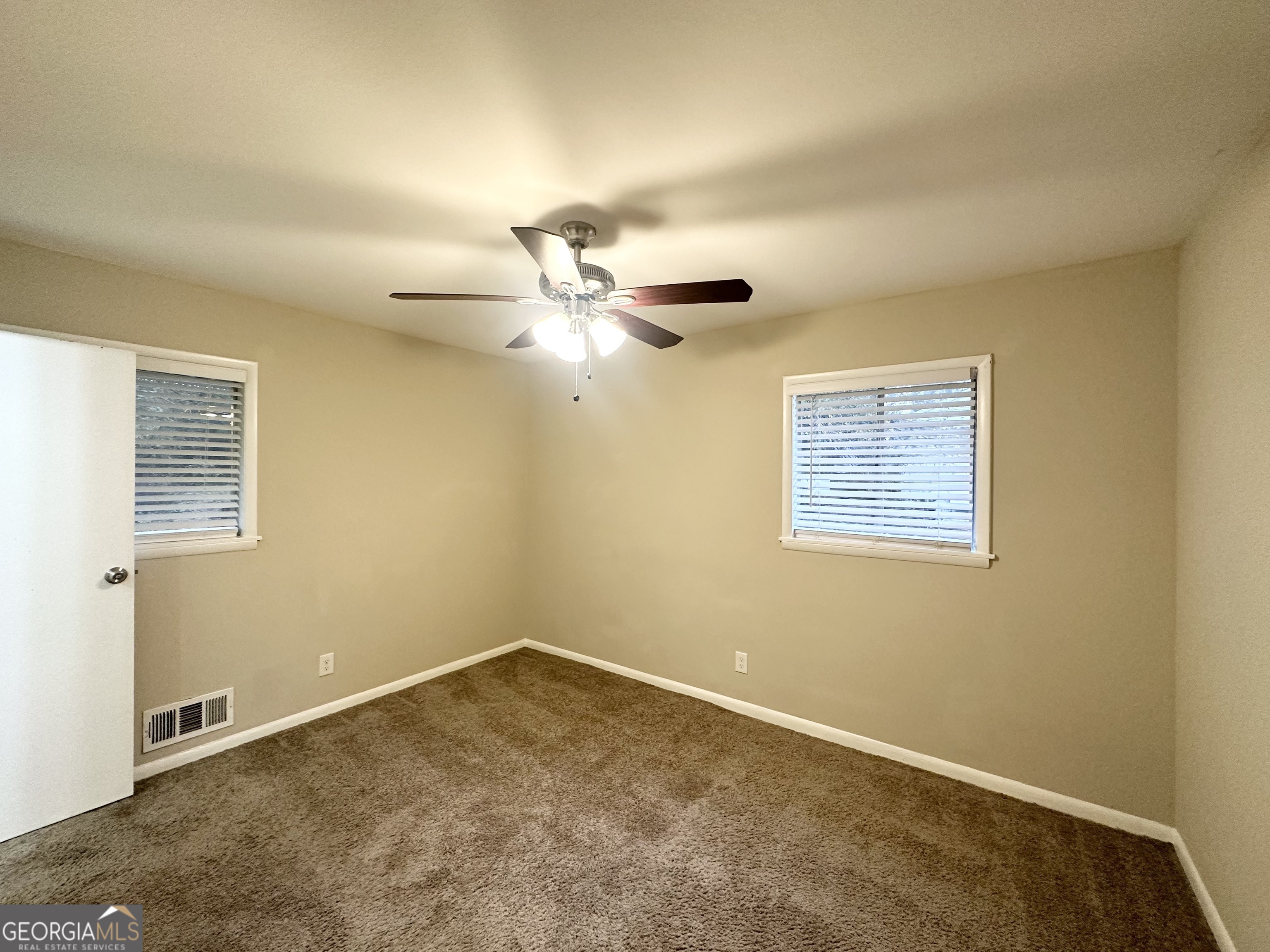 1519 Pine Glen Circle Decatur, GA 30035 - Photo 6 of 10 a view of an empty room with a window