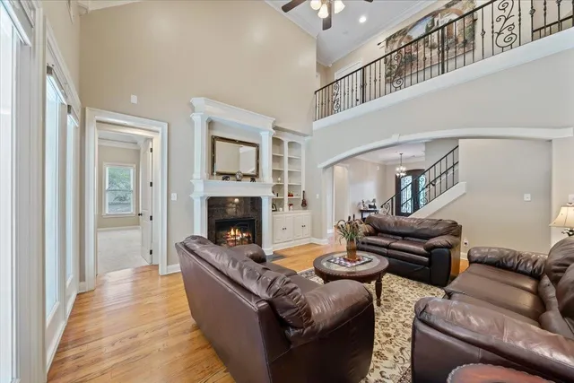 a kitchen with stainless steel appliances kitchen island granite countertop a sink stove and refrigerator