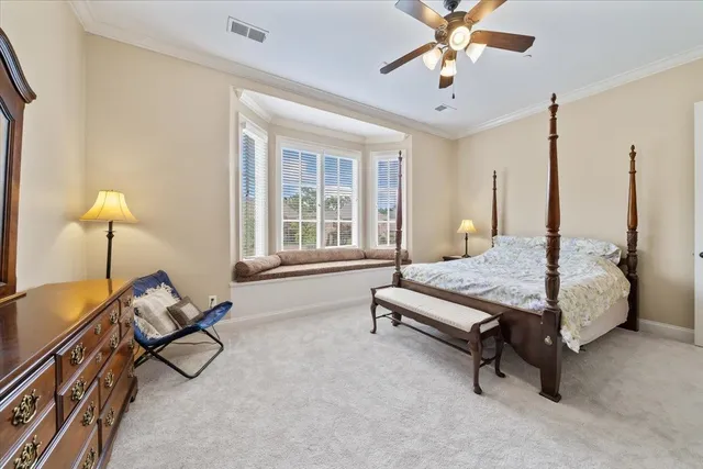 a bathroom with a double vanity sink mirror and toilet