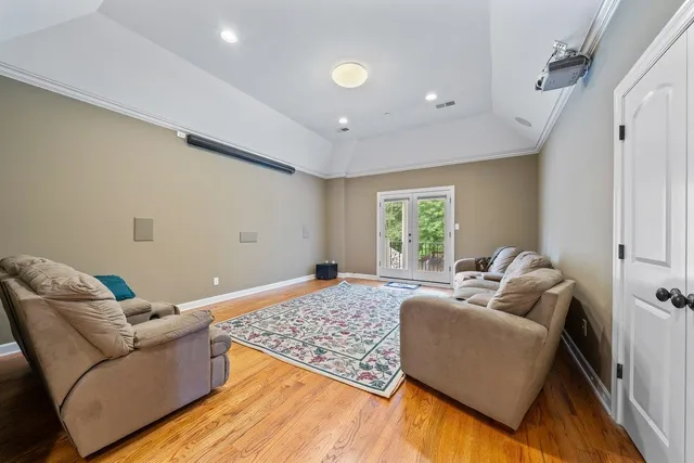 a view of a room with a large window