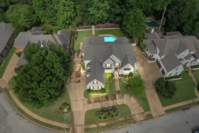 an aerial view of a house having yard