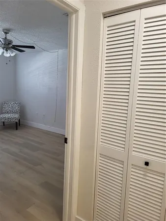 a view of a room that has a window in it