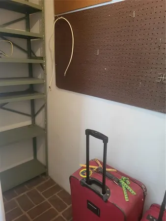 a room with table and a mirror