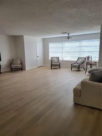 a view of a livingroom with furniture and a couch