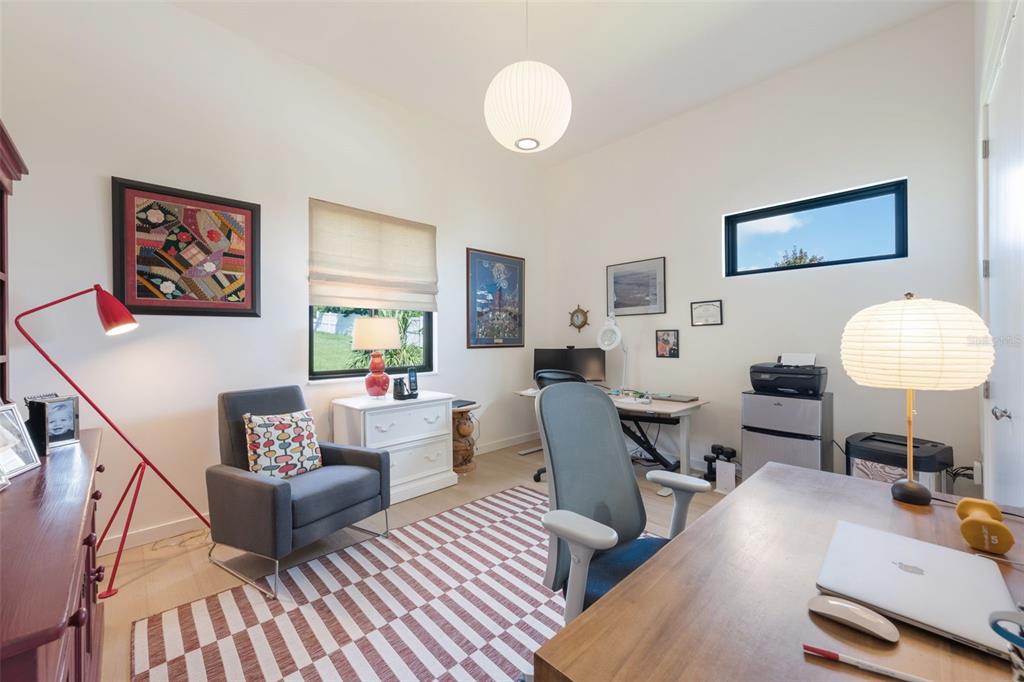 17640 Broad Street Montverde, FL 34756 - Photo 23 of 48 a living room with furniture and a wooden floor