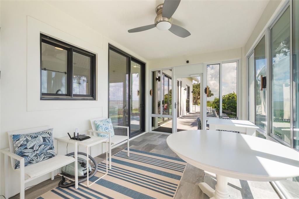 17640 Broad Street Montverde, FL 34756 - Photo 27 of 48 a living room with furniture and large windows