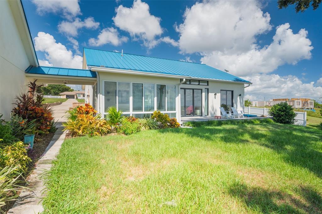 17640 Broad Street Montverde, FL 34756 - Photo 31 of 48 a front view of house with yard and green space