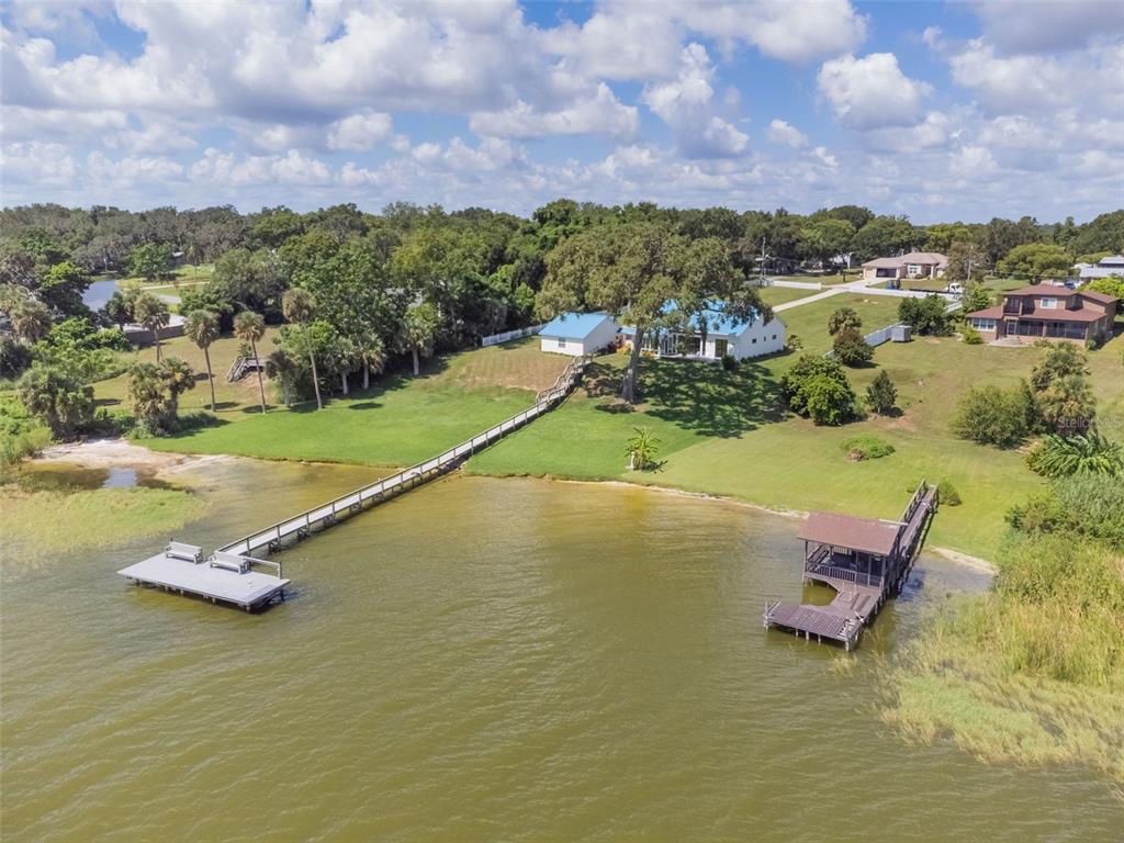 17640 Broad Street Montverde, FL 34756 - Photo 36 of 48 a view of a lake with a mountain