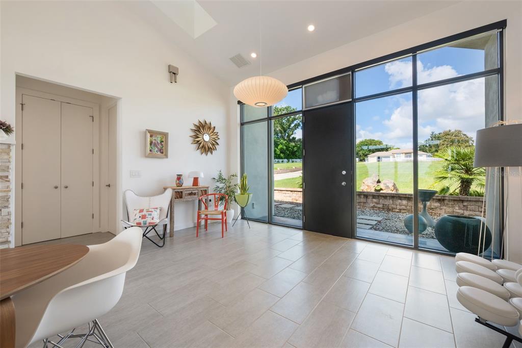 17640 Broad Street Montverde, FL 34756 - Photo 4 of 48 a living room with furniture and a large window