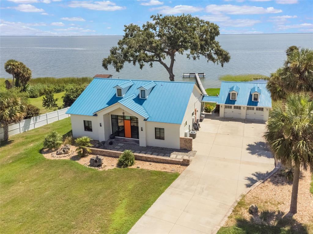 17640 Broad Street Montverde, FL 34756 - Photo 42 of 48 a front view of a house with a yard
