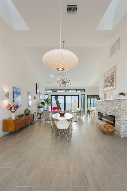 17640 Broad Street Montverde, FL 34756 - Photo 5 of 48 a living room with furniture and a chandelier