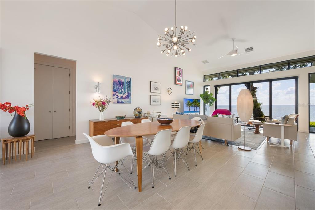 17640 Broad Street Montverde, FL 34756 - Photo 6 of 48 a living room with furniture and a chandelier