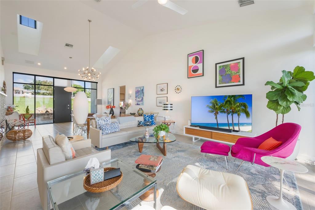 17640 Broad Street Montverde, FL 34756 - Photo 8 of 48 a living room with furniture and a rug