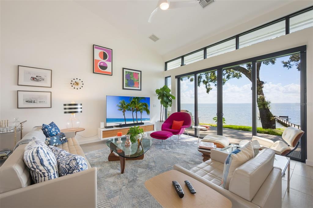 17640 Broad Street Montverde, FL 34756 - Photo 9 of 48 a living room with patio furniture and a large window