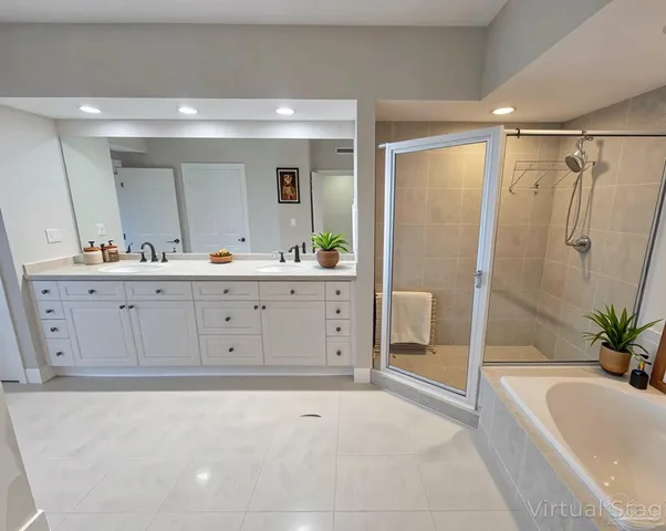 a view of a swimming pool with a bench and lawn chairs