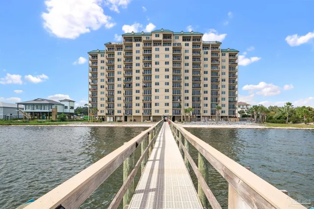 a view of a balcony with chairs