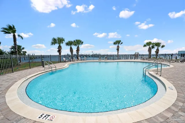 a en suite bathroom with a double sink and mirror