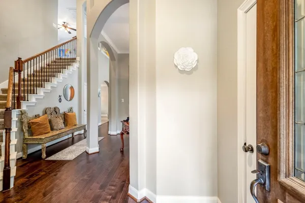 a view of entryway with wooden floor