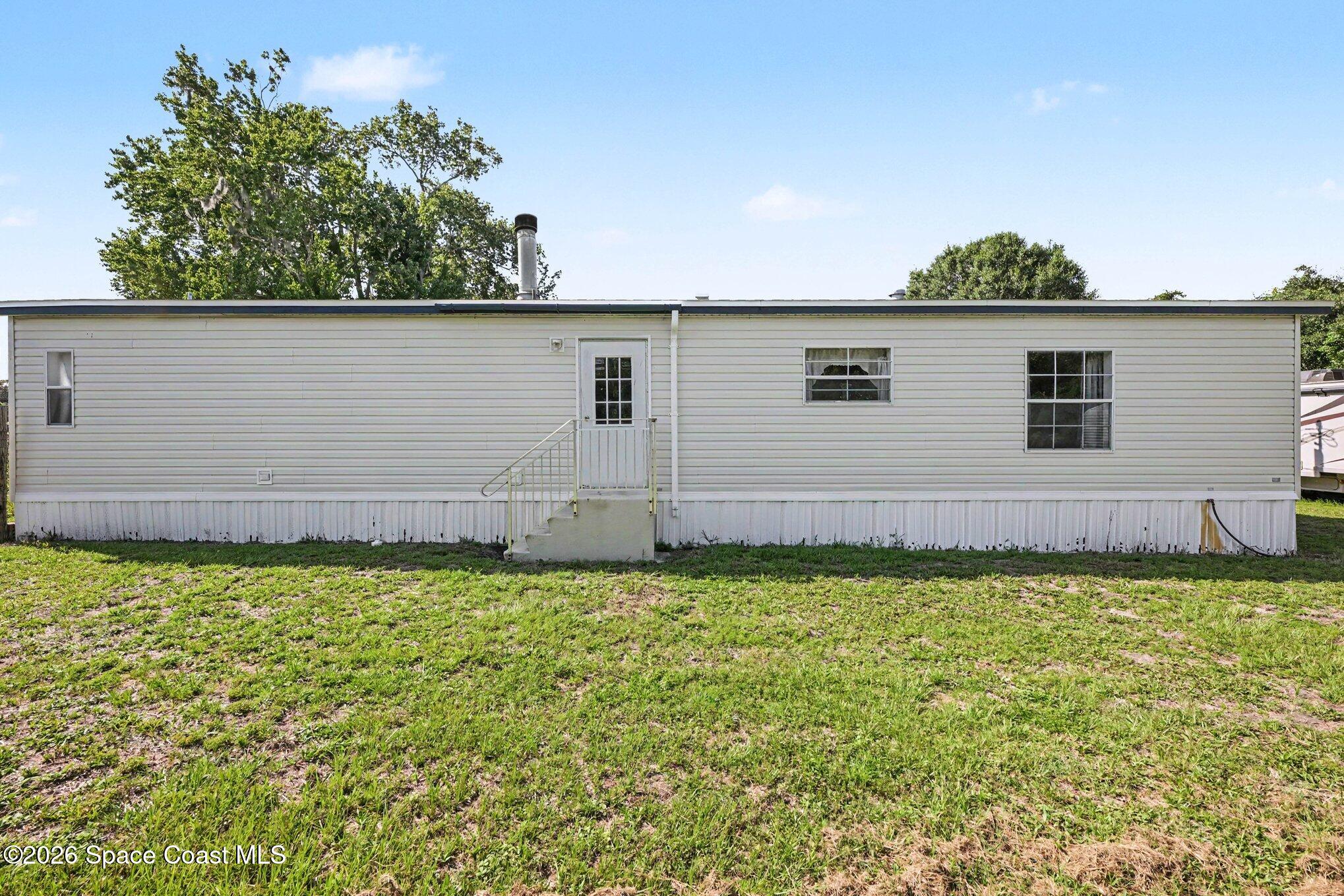 4785 Harrison Road Mims, FL 32754 - Photo 20 of 34 rear elevation