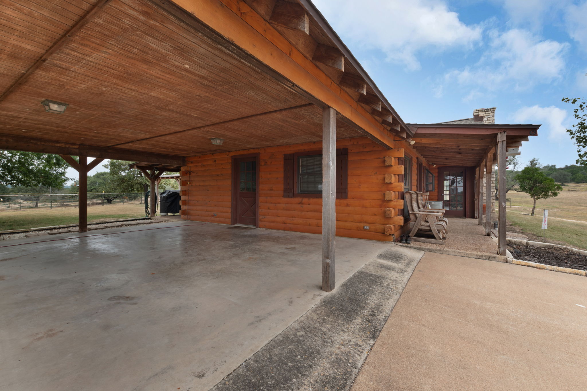 124 Old Mission Road Kempner, TX 76539 - Photo 26 of 40 a view of a house with backyard and a porch
