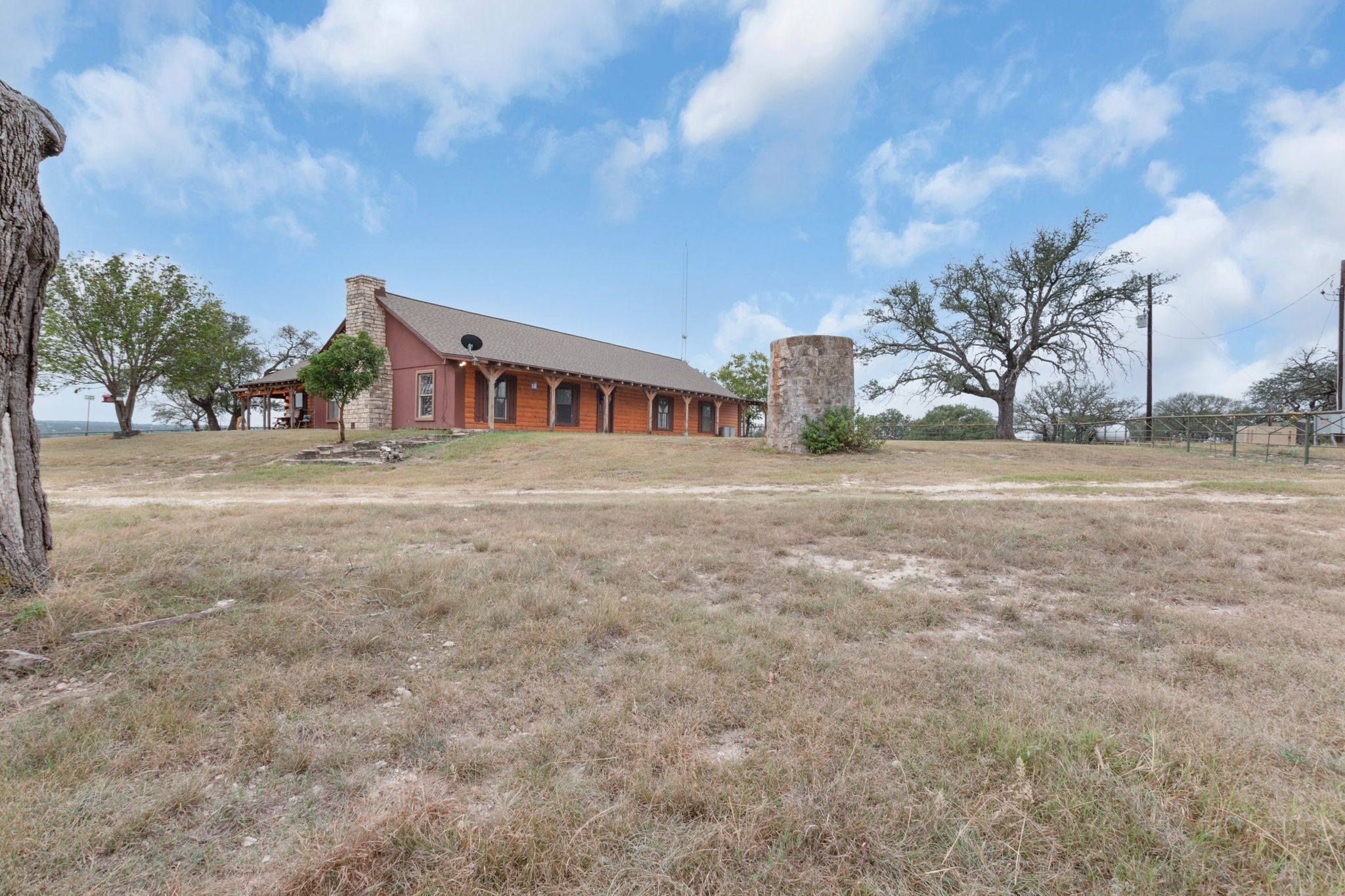 124 Old Mission Road Kempner, TX 76539 - Photo 30 of 40 a view of an house with backyard space and city view