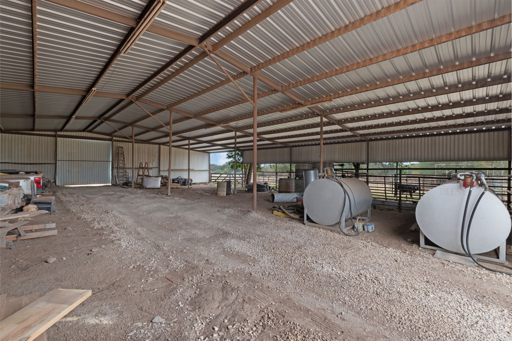 124 Old Mission Road Kempner, TX 76539 - Photo 31 of 40 a view of a garage with table and chairs